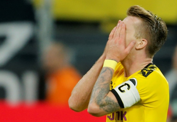 Marco Reus leaves the pitch due to injury during Bundesliga clash between BVB and Wolfsburg