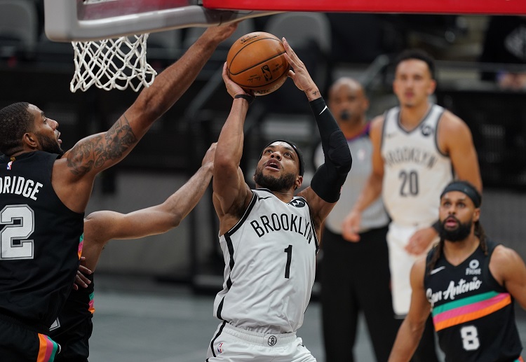 LaMarcus Aldridge trying to shoot the ball during the NBA game between Spurs and Nets